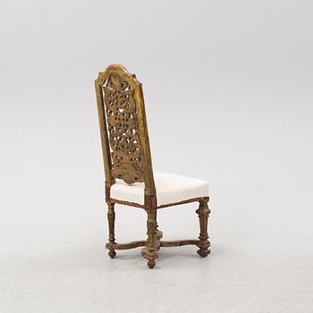 A carved Baroque style chair, second half of the 19th Century.