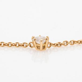 Necklace, 18K gold with heart-shaped diamond.