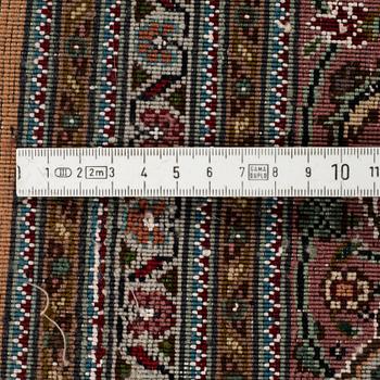 A RUG, Old Tabriz, part silk, ca 201 x 152 cm.