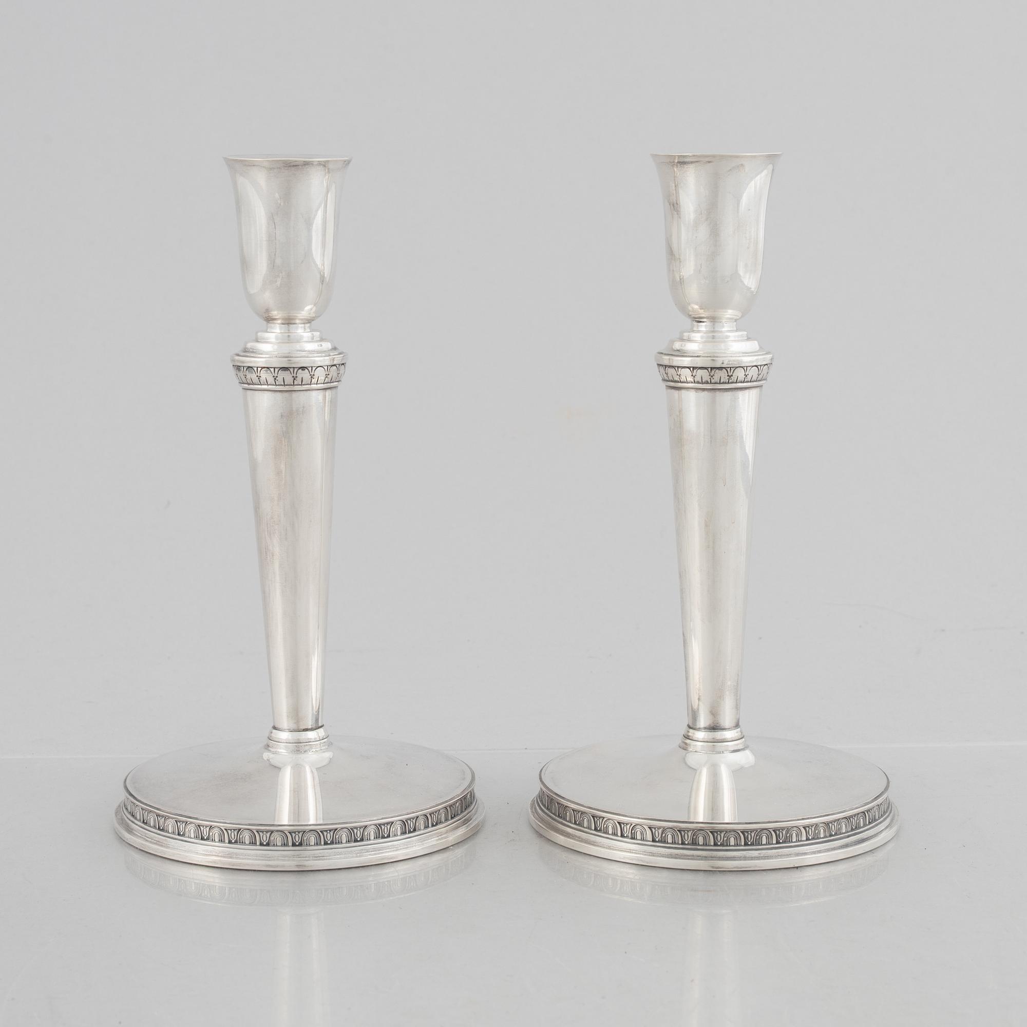 Eric Råström, a pair of silver candlesticks, Råströms Silver- O Nysilverfabrik , Stockholm 1957.