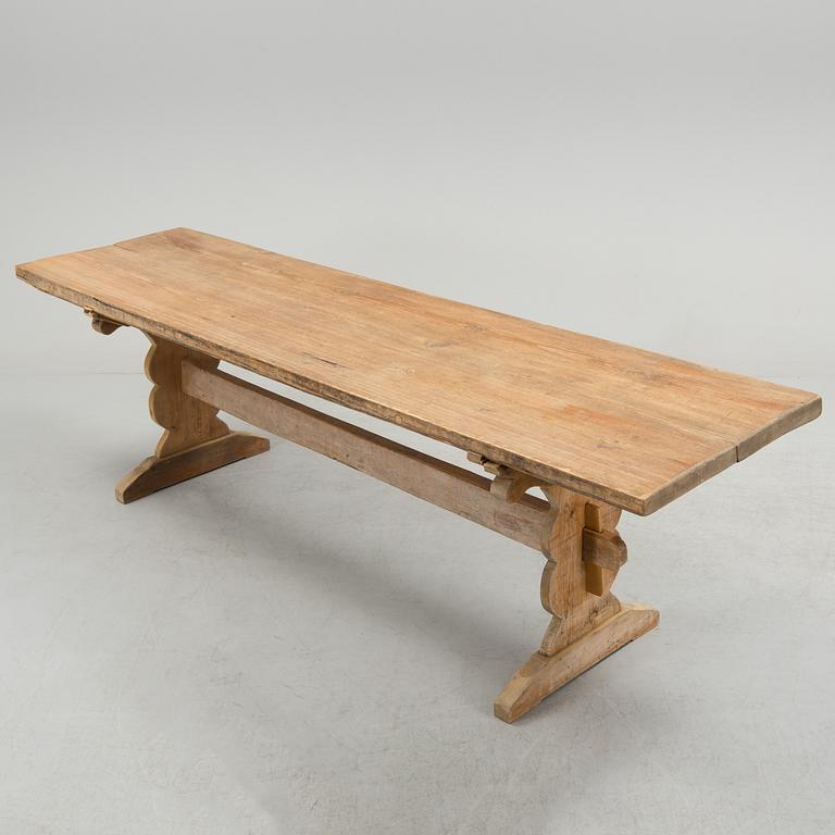 A 20th century pine table.