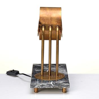 An Austrian brass and black marble table lamp, marked Vienna 1928.