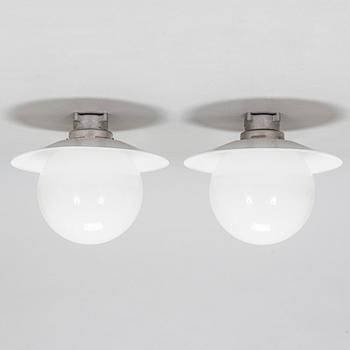 Paavo Tynell, a pair of mid-20th century outdoor  wall lamps for Idman Finland.