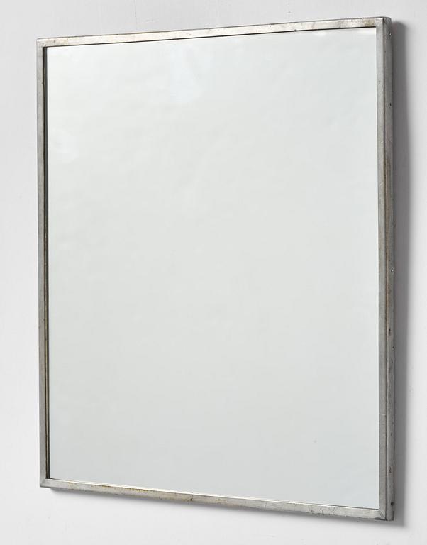 Firma Svenskt Tenn, a pewter wall mirror, Stockholm, 1935.