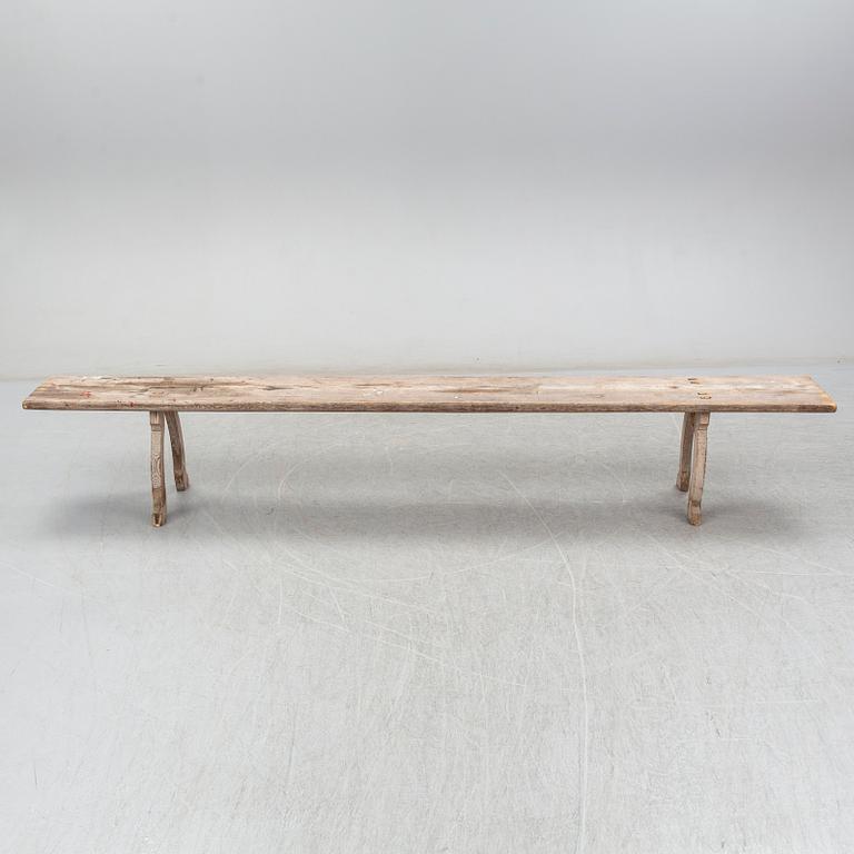 A pine bench, 19th Century.