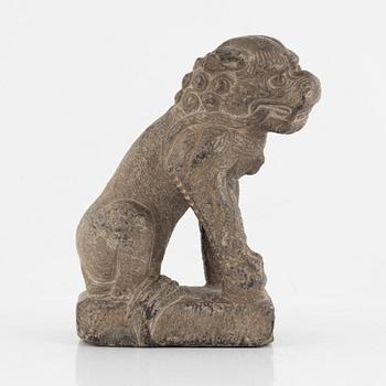 A Chinese stone Buddhist lion, Ming dynasty (1368-1644).