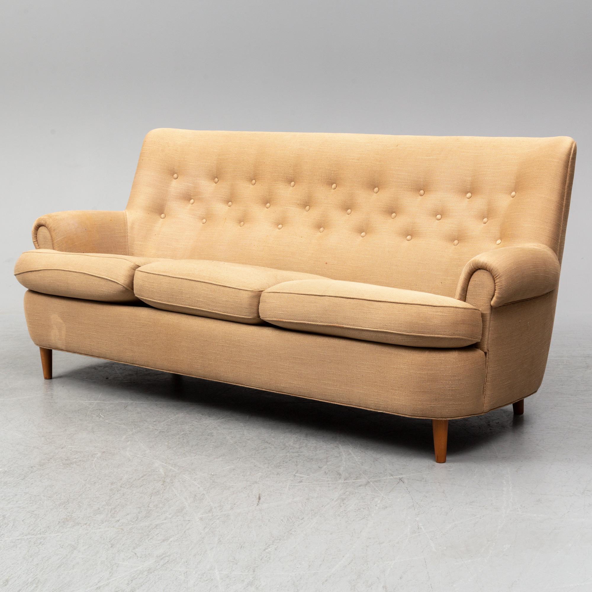 A 'Hemmakväll' sofa by Carl Malmsten.