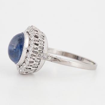 Cabochon-cut sapphire and eight-cut diamond ring.