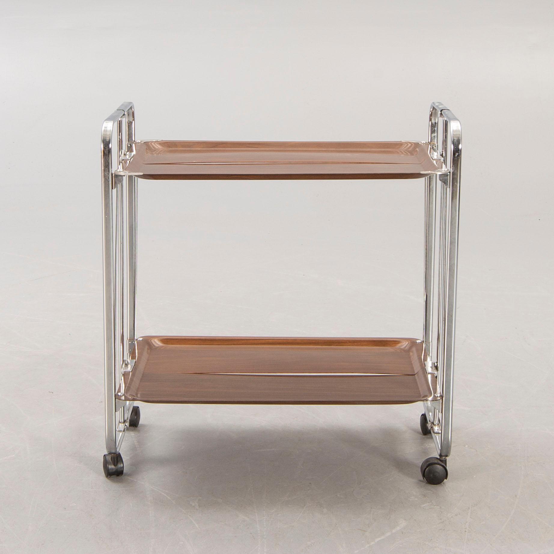 A Gerinol mid 1900s folding serving torlley.