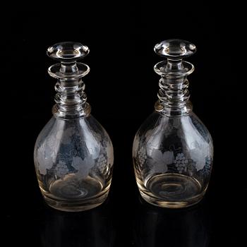 A pair of mid 19th century glass decanters and stoppers.