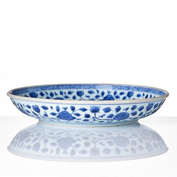 A blue and white ming-style 'lotus bouquet' dish, Qing dynasty, 18th century.