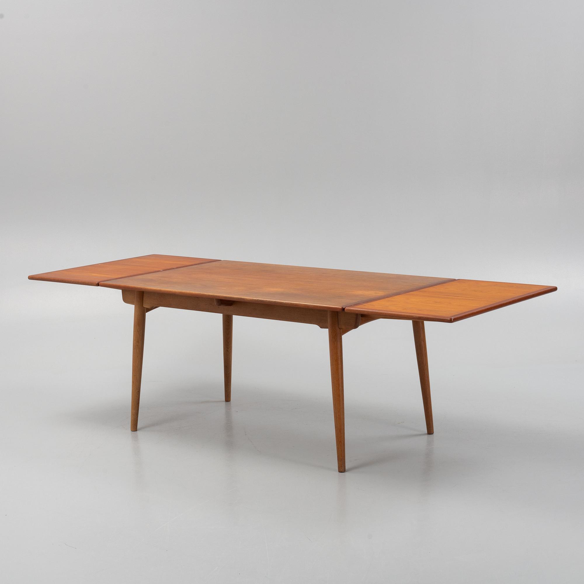 Hans J. Wegner, a  dining table, Andreas Tuck, Denmark.