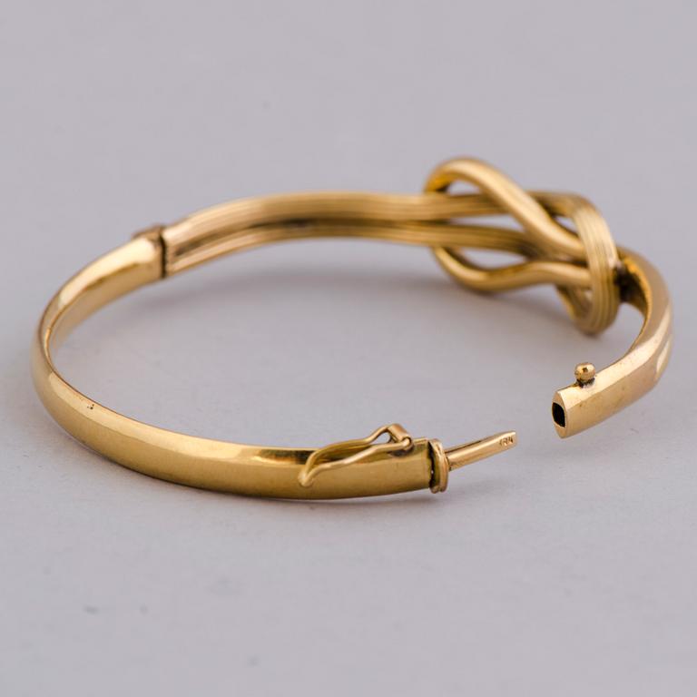 ARMRING, 18K guld.