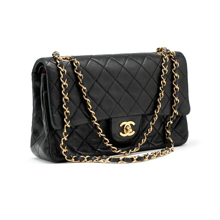 CHANEL, a quilted blue leather "Double Flap" shoulder bag.