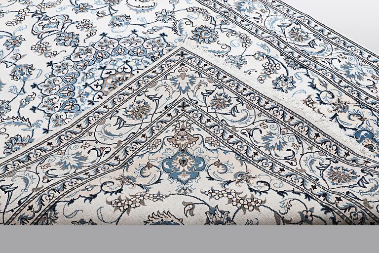 A carpet, Nain, 285 x 196 cm.