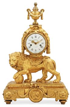 699. A French Louis XVI 1770's gilt bronze Lion mantel clock signed "Ageron a Paris nr 428".
