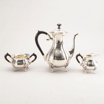 A 20th century German three parts silver tea service with Swedish import stamps.