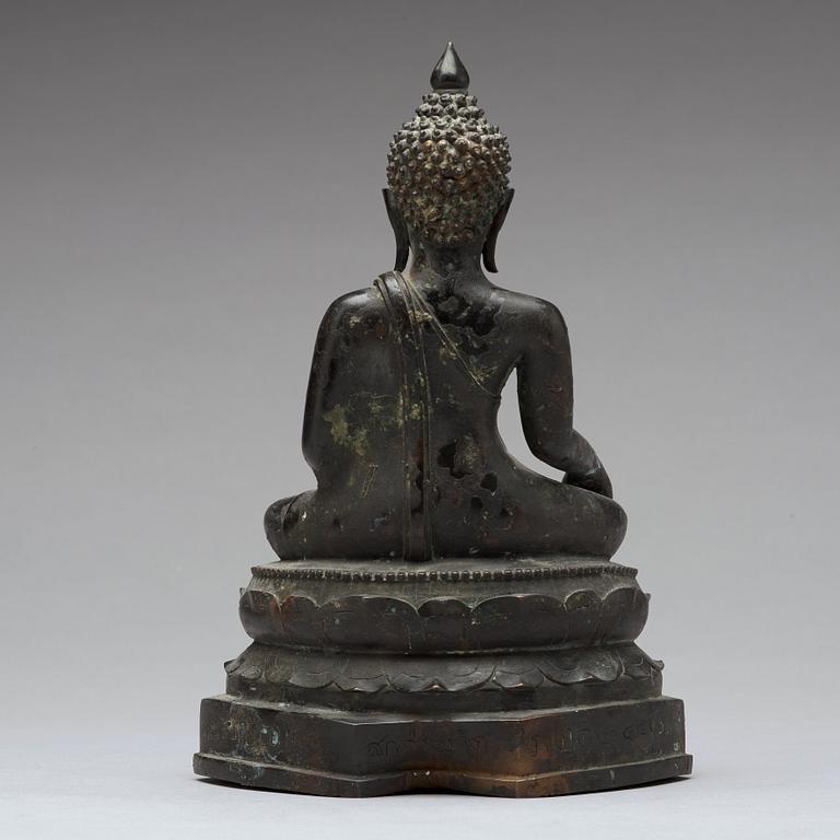 A bronze sculpture of a seated buddha, Thailand, presumably Lanna, 18th Century.