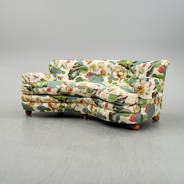 A model 968 sofa by Josef Frank for Firma Svenskt Tenn.