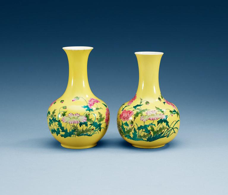 Two yellow ground vases, and with a romantic poem, Qing dynasty with Yongzheng seal mark.