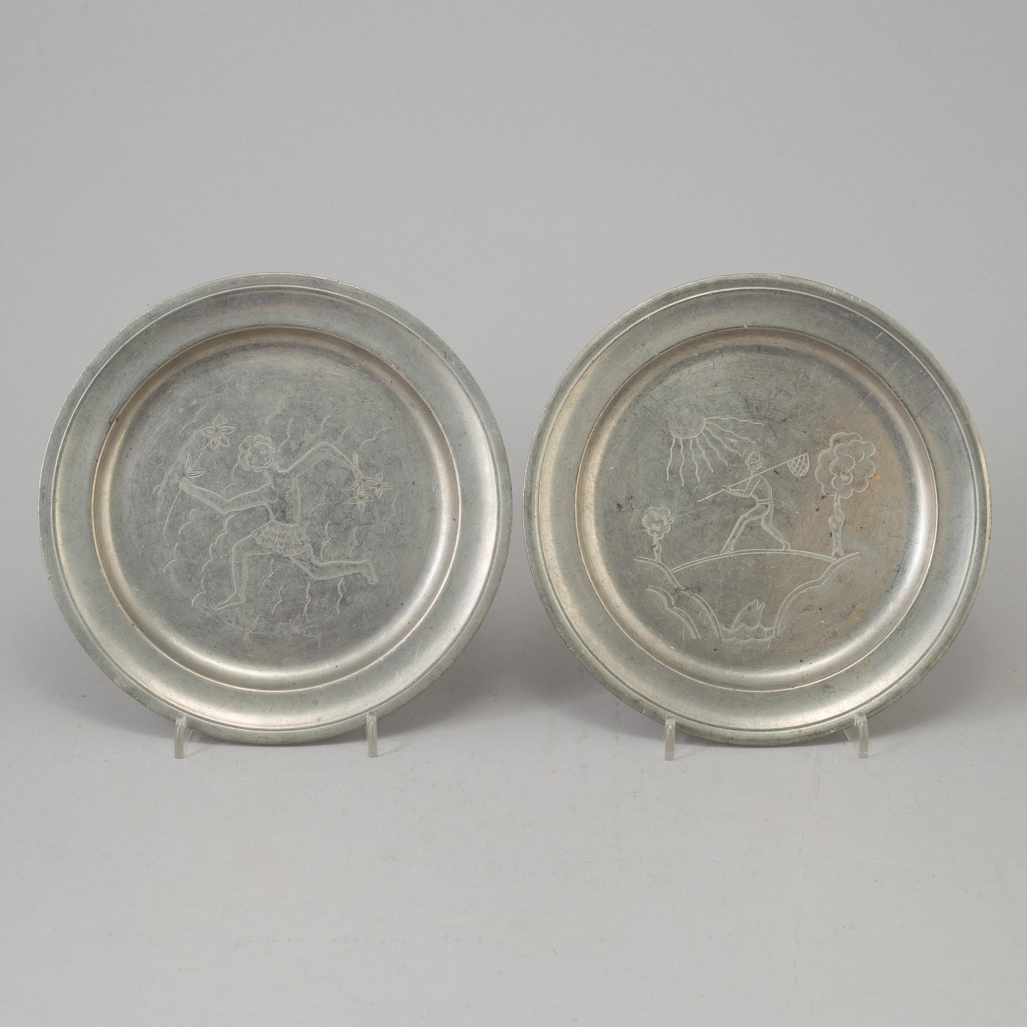 Two pewter Firma Svenskt Tenn plates from 1929.