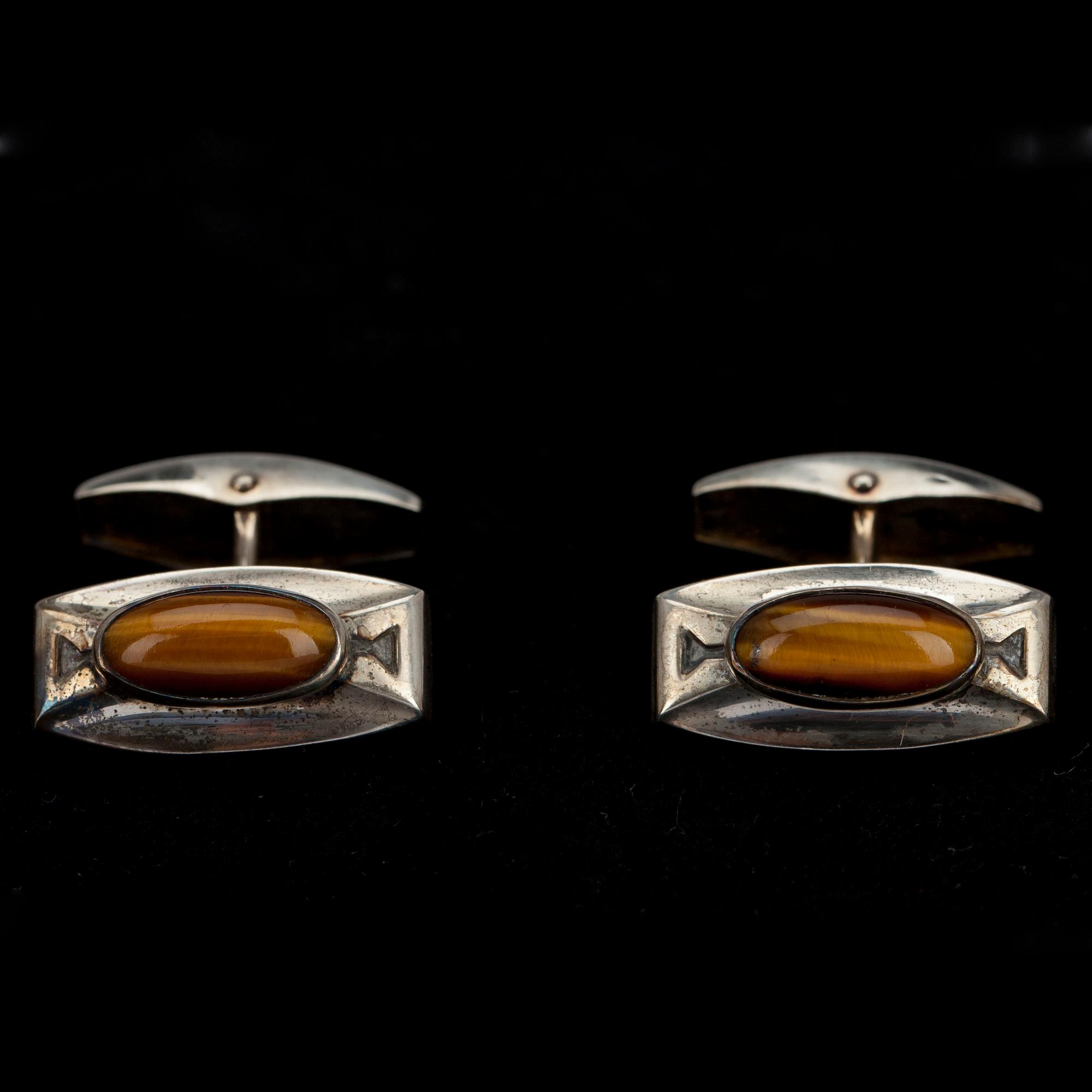 MANSCHETTKNAPPAR, 2 par, silver och tigeröga. Finska stämplar 1961, 1963.