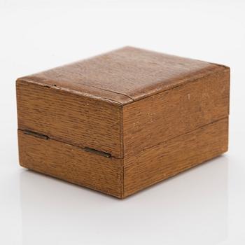 Alexander Fuld, a parcel-gilt beaker, Moscow 1895. In an oak case marked I.E. Morozov St. Petersburg.