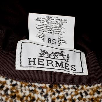 HERMÈS, a brown suede hat, size 58.