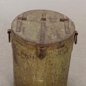 A 20th century metal barrel.