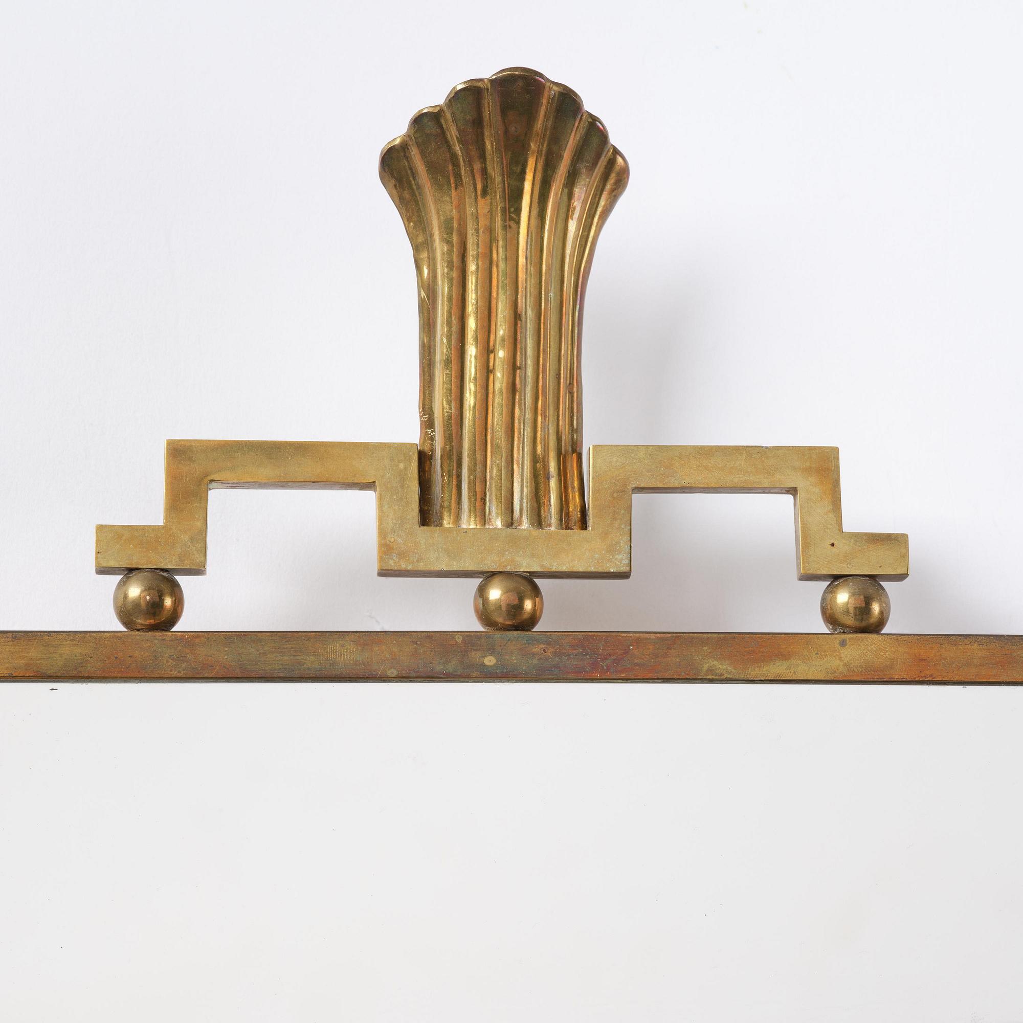 Lars Holmström, a Swedish Grace brass wall mirror, Arvika, 1920-30s.