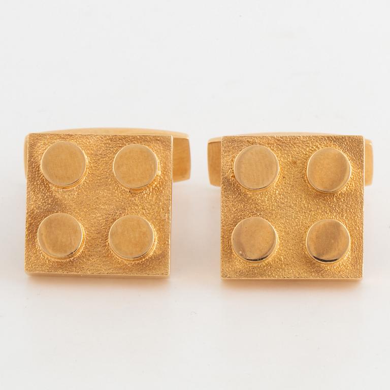 Lego 14K gold cufflinks.