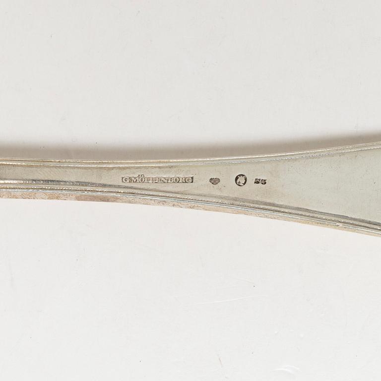 Three Swedish silver serving spoons, Stockholm, marks of G Möllenborg 1824 and G Folcker 1828-1834.