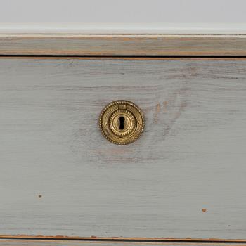 A 20th century Gustavian style chest of drawers.