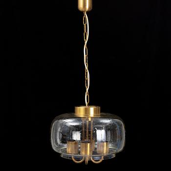 A 1960/70s glass and brass ceiling lamp.