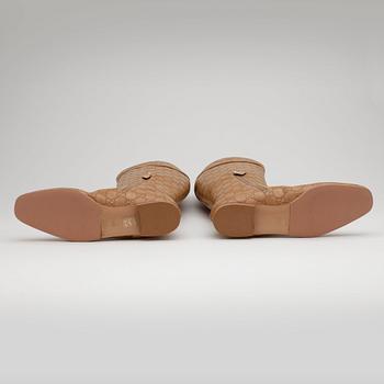 GUCCI, ett par stövlar.
