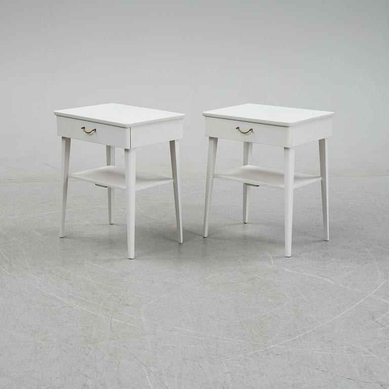 A pair of mid 20th century bedside tables.