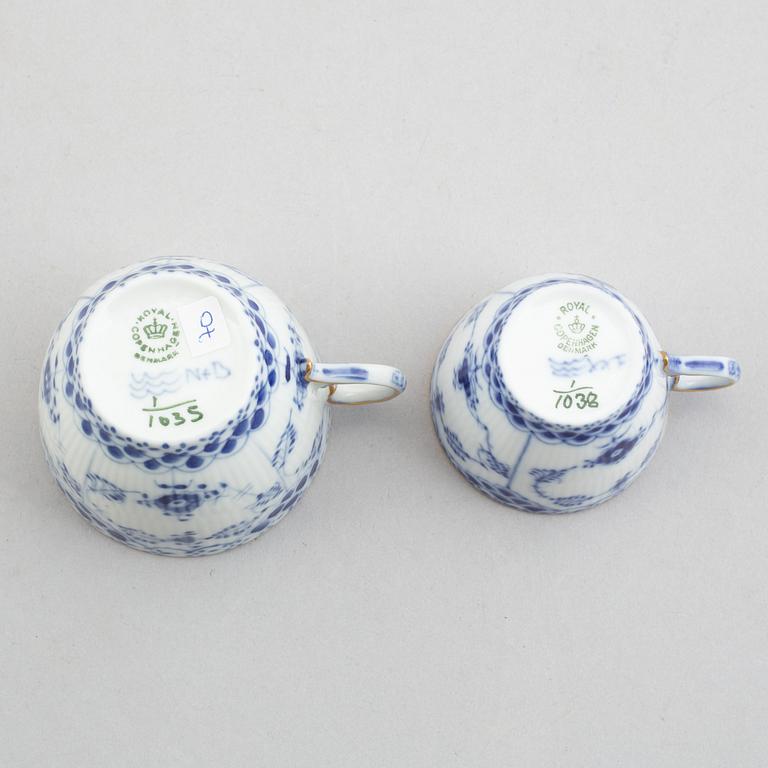A plate, a coffeecup with saucer and a moca cup with saucer, "Blue Fluted half lace"/"Musselmalet", Royal Copenhagen.