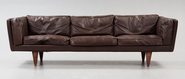 An Illum Wikkelsø three seated brown leather sofa, Michael Laursen, Denmark 1960's.