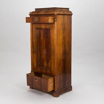 A Late Empire cabinet from the second quarter of the 19th century.