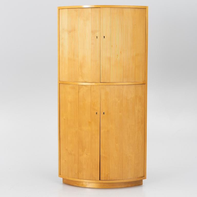Corner cabinet, circa the mid-20th century.
