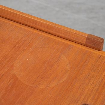 a mid 20th century teak serving trolley.