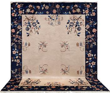 A semi-antique carpet, China, c. 310 x 240 cm.