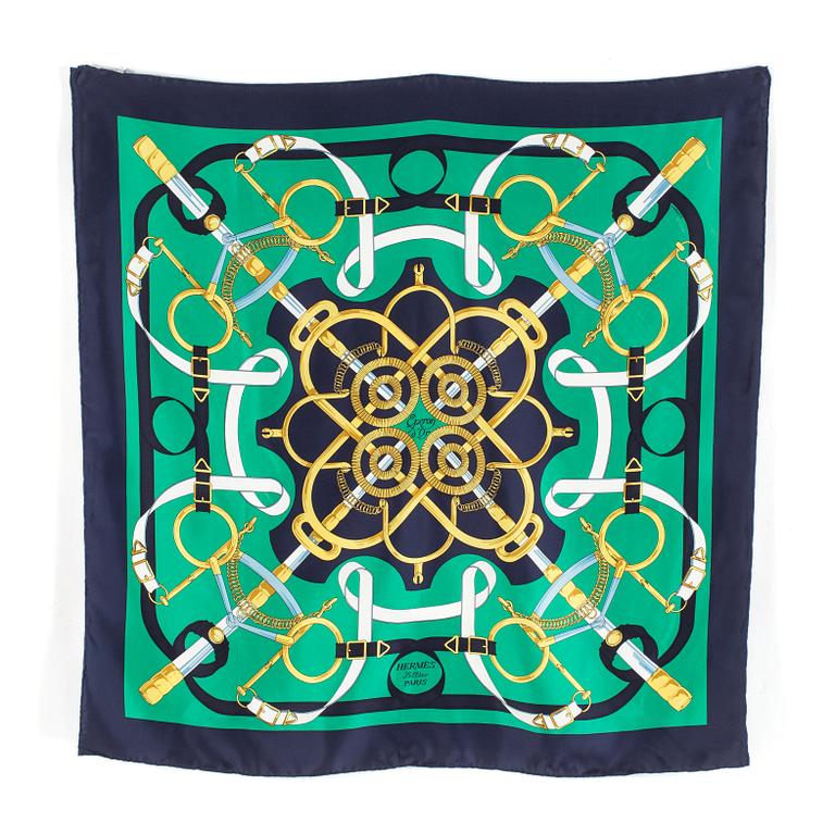 A silk scarf by Hermès "Eperon d'Or".