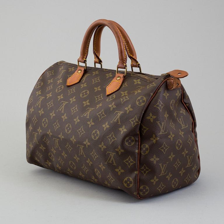 a Louis Vuitton "Speedy 35" bag.