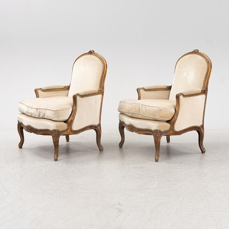 A pair of Louis XV-style lounge chairs, 20th Century.