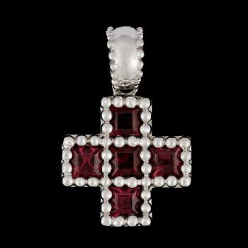 5. A tourmaline cross pendant.