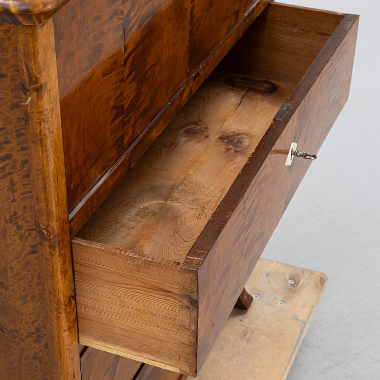 A birch-veneered dresser, second half of the 19th century.