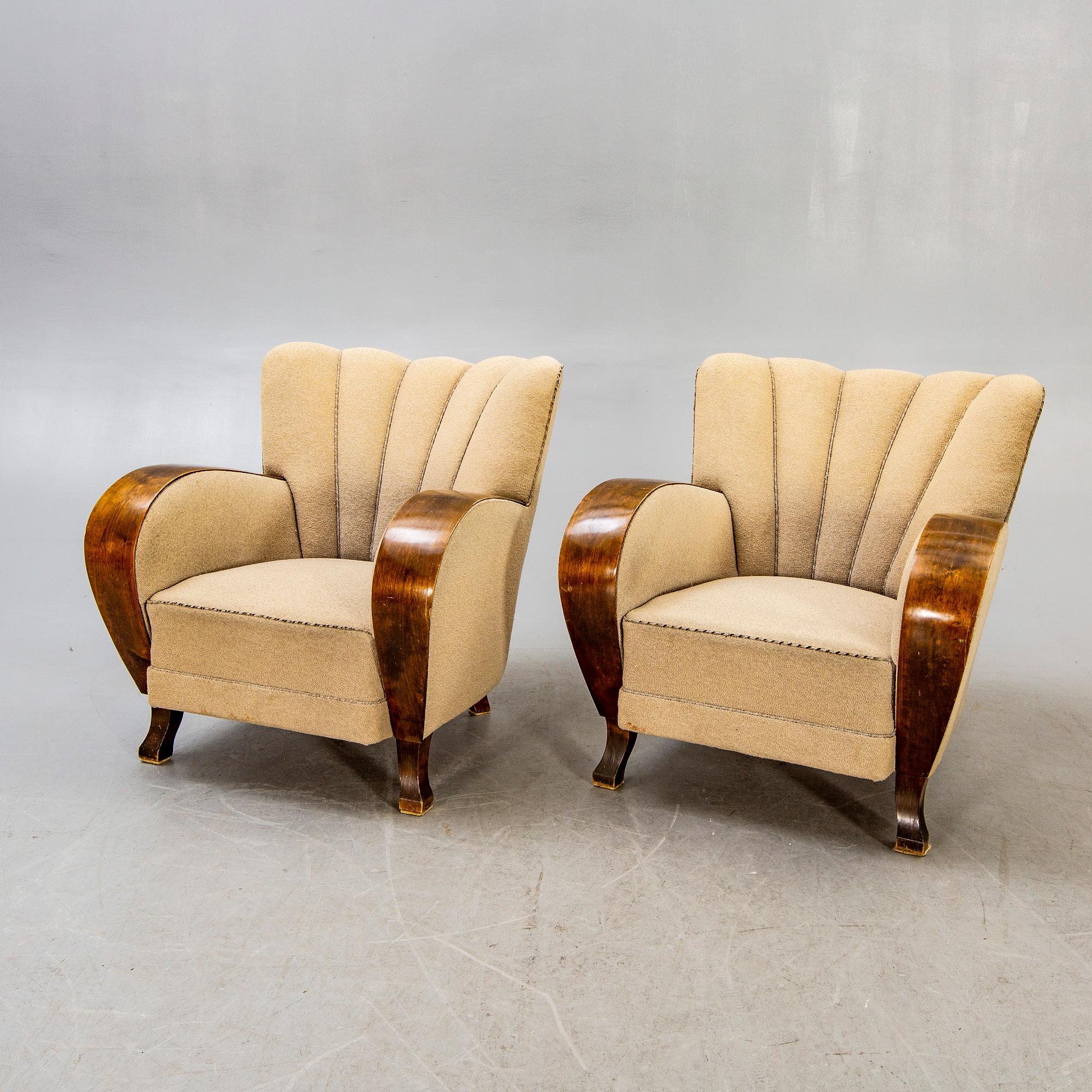 A pair of Art Deco armchairs.