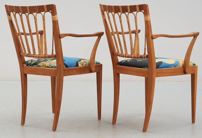 A pair of Josef Frank mahogany and rattan armchairs, Svenskt Tenn, model 1165.