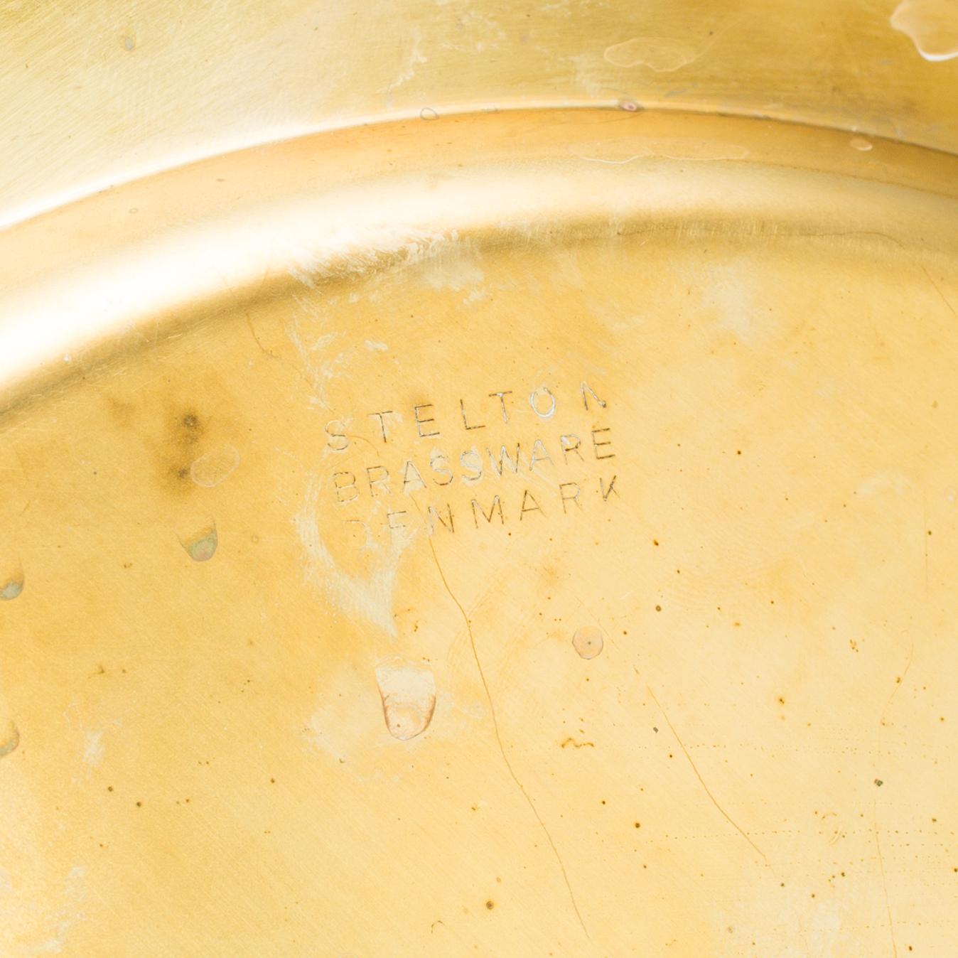 21 BRASS UNDER PLATES, second half of the 20th century.